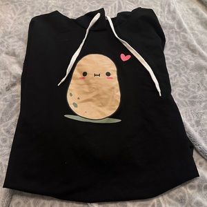 Black sweater with potato on front, has a hood and 2 stripes on each sleeve